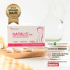  NATALIS® Pre Packung mit Qualitätszertifikat auf einem Tisch, umgeben von goldener Deko und einem Holzbrett.